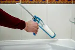 Easy bathroom caulking tips so you can do it yourself.  The result packs a big decorative punch that makes this fix more than worth the effort.