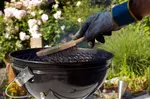 Come Memorial Day, Americans light up - our grill, that is. Here's how to clean a grill and get it ready to glow for the season ahead.