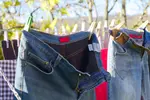 These laundry tips for jeans can help keep your kid's jacket and jeans from looking like they're your grandmother's relics from the flower power days.