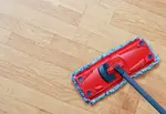 Tips for cleaning laminate floors. Keep laminate floors luxurious by regularly vacuuming, dust-mopping, or wiping the floors with a damp (not wet) cloth.A vacuum, a little vinegar, and spot clean-ups are all that's required.