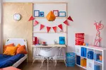 These tips for organizing kids rooms can help get it all together, from toys and clothes to artwork.