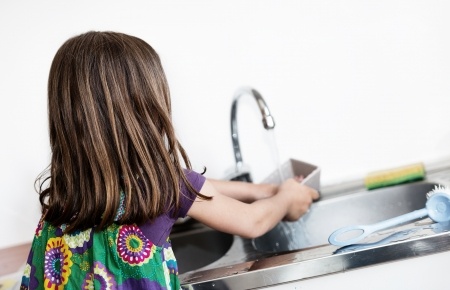 Dish washing is a good party chore for kids.