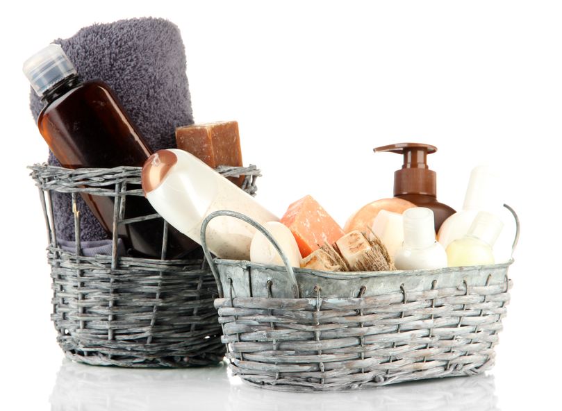 Two baskets with guest bathroom supplies.