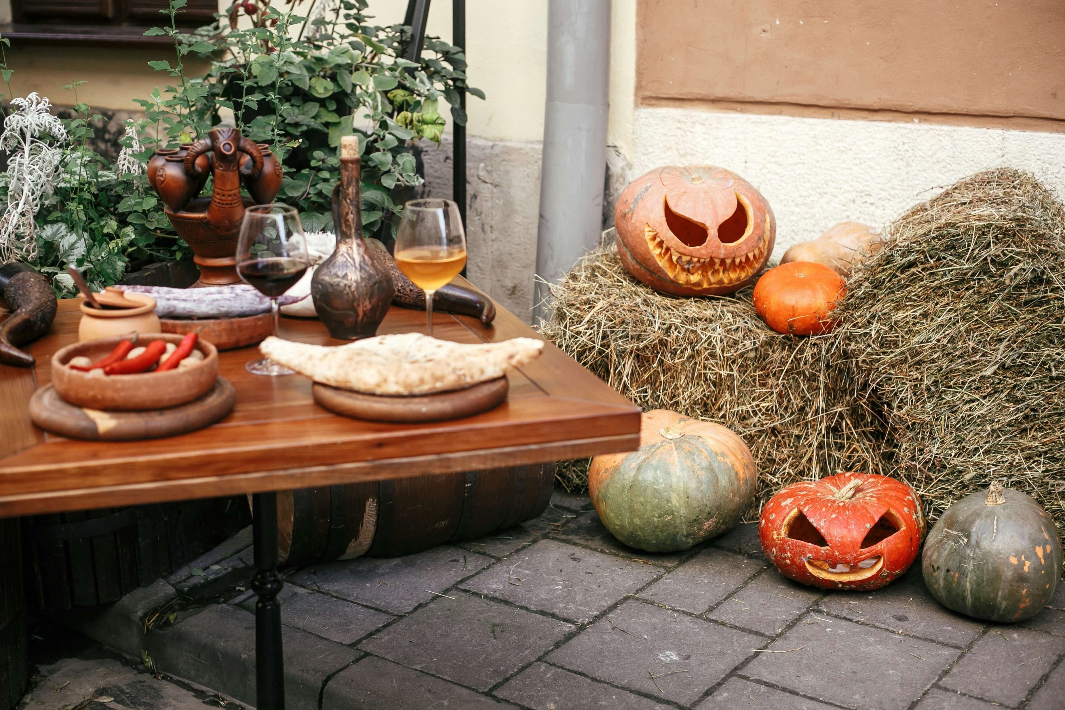Halloween food table in a backyard.