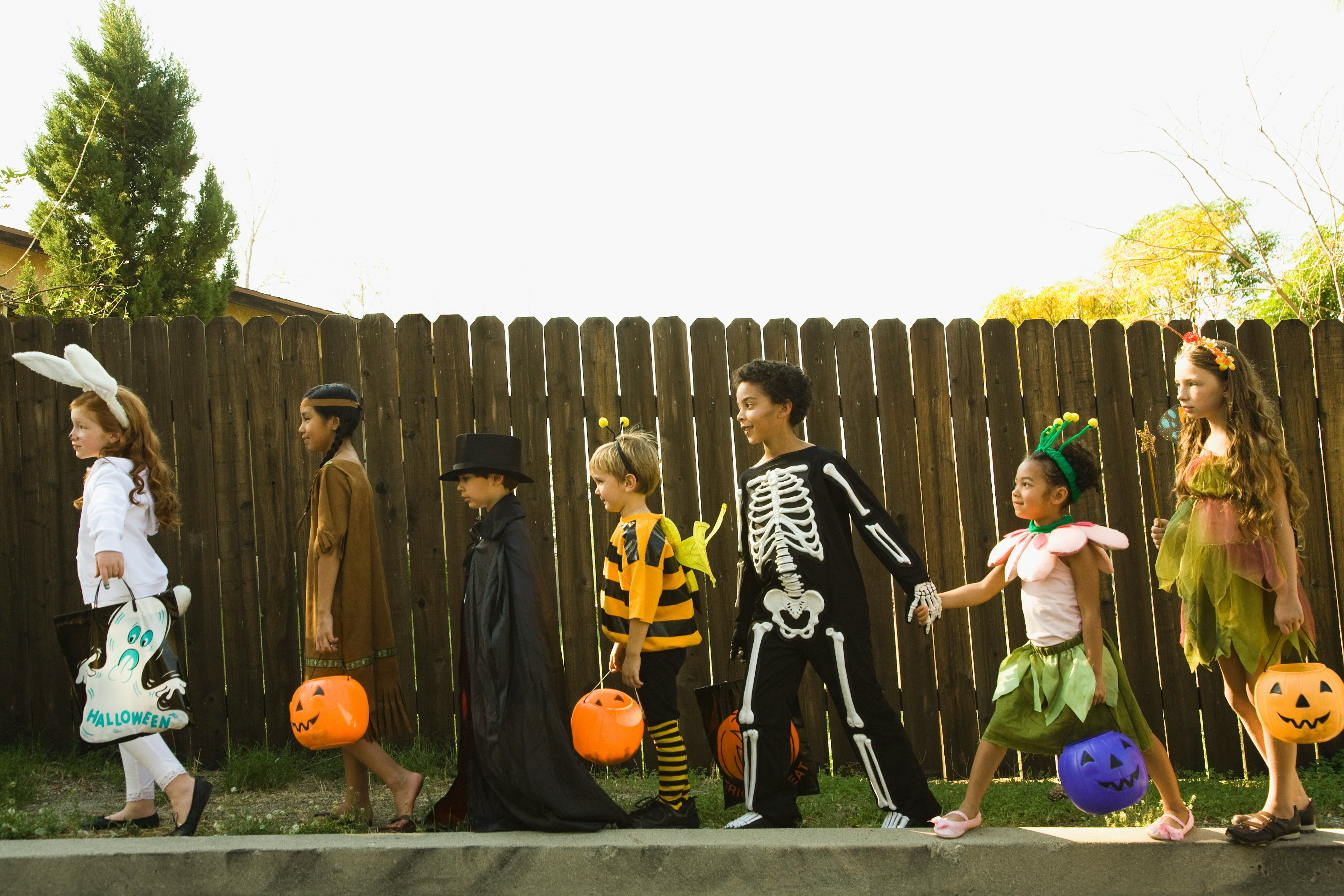 Costumed children in a Halloween parade.