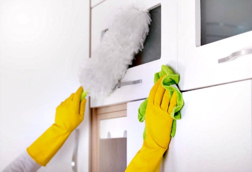Clean kitchen surfaces.