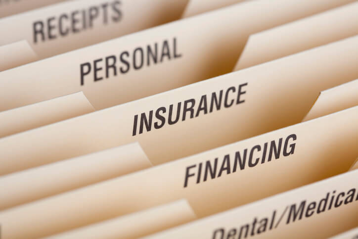 File folders with neatly printed labels.