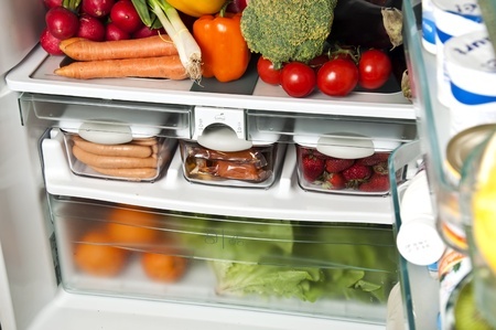 Refrigerator filled with fresh food.
