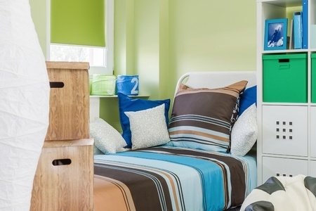 Tween bedroom with locker storage shelves.